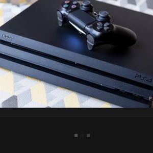 PS4 PRO(2 controllers, cables,and 5 Games included)